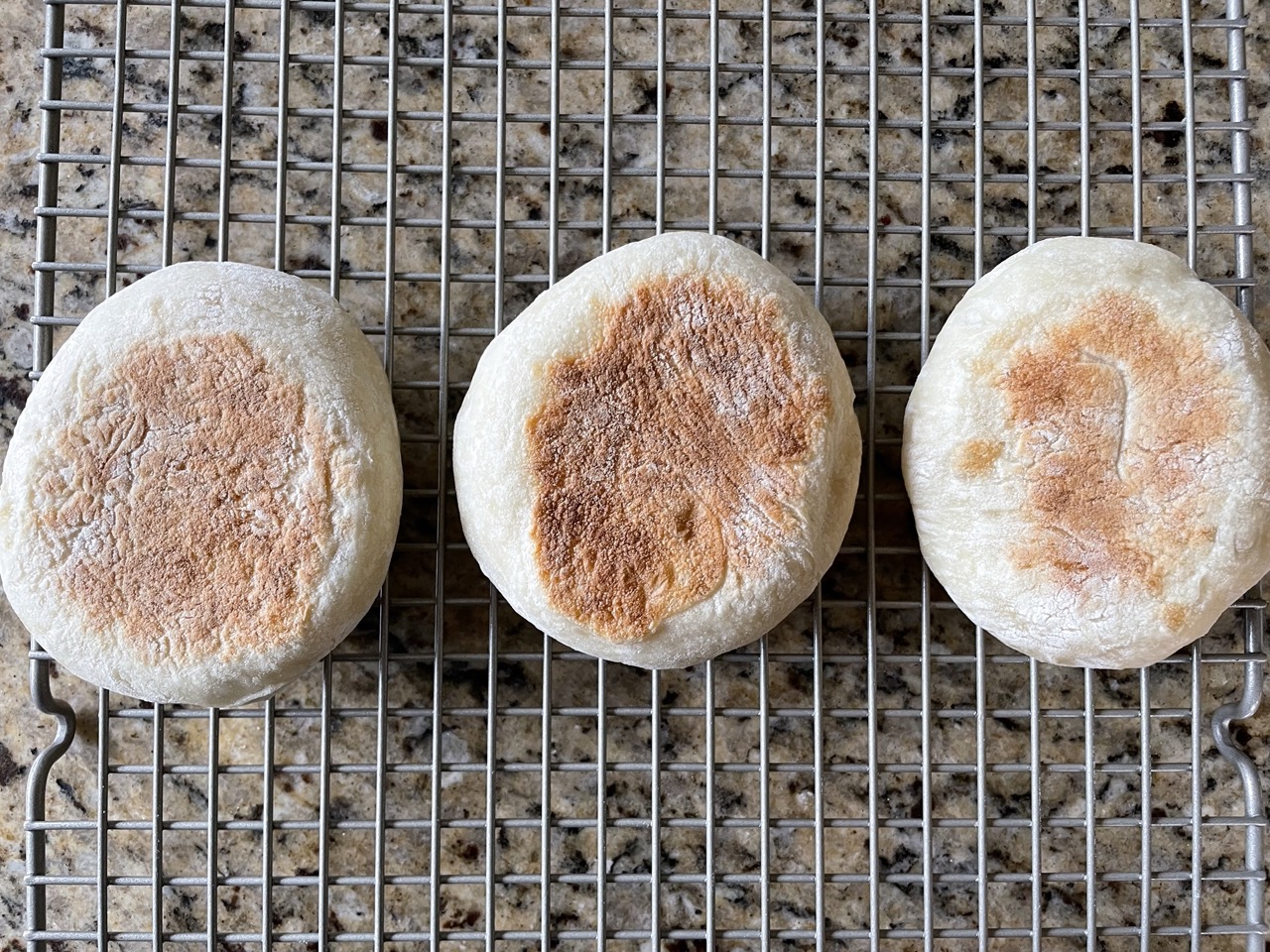 shows three finished English muffins