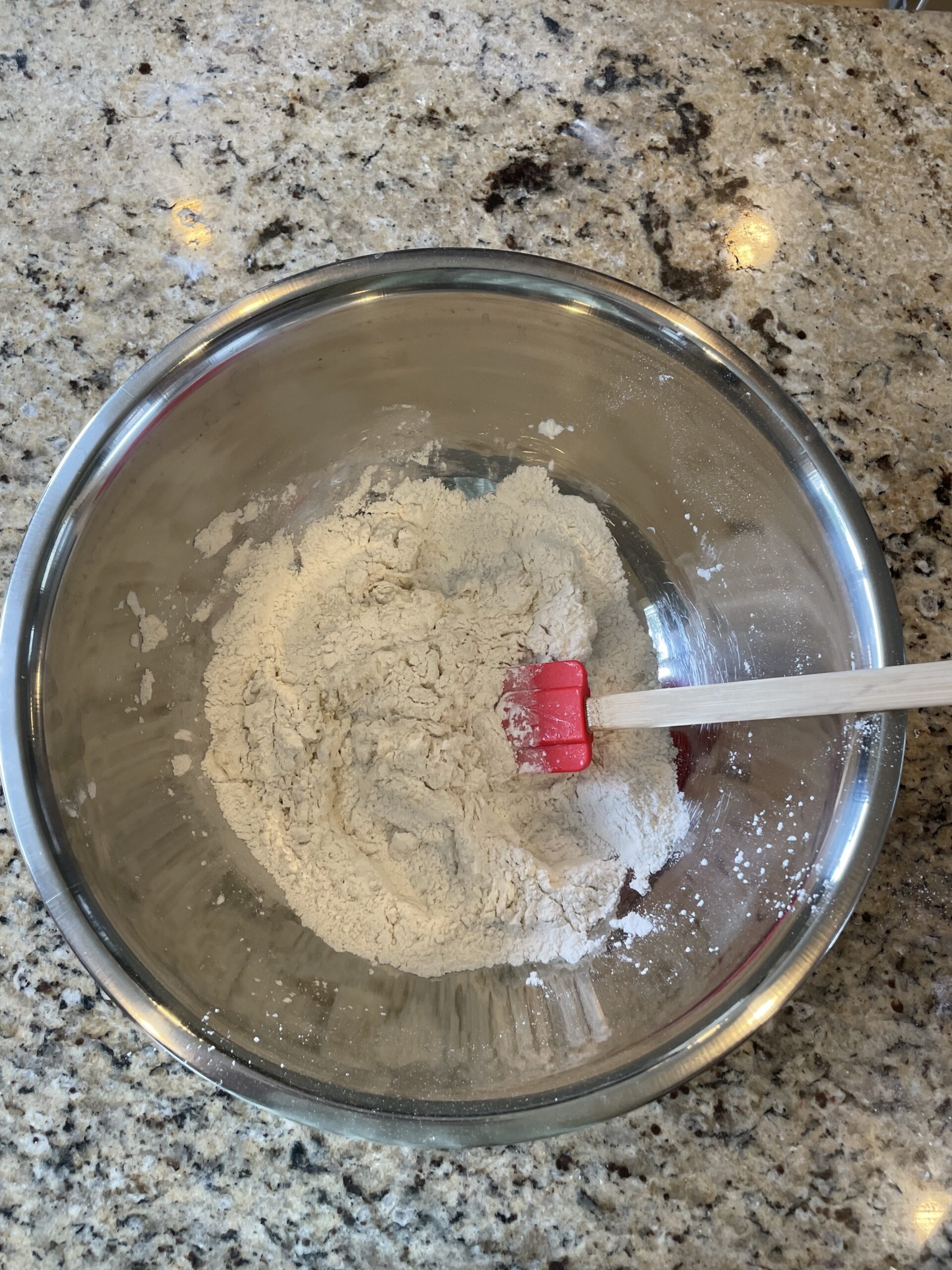mixing the dry ingredients together before the wet