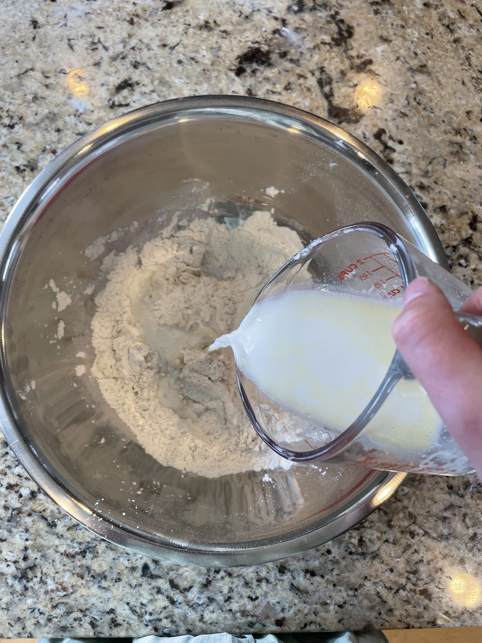 adding the wet ingredients into the dry