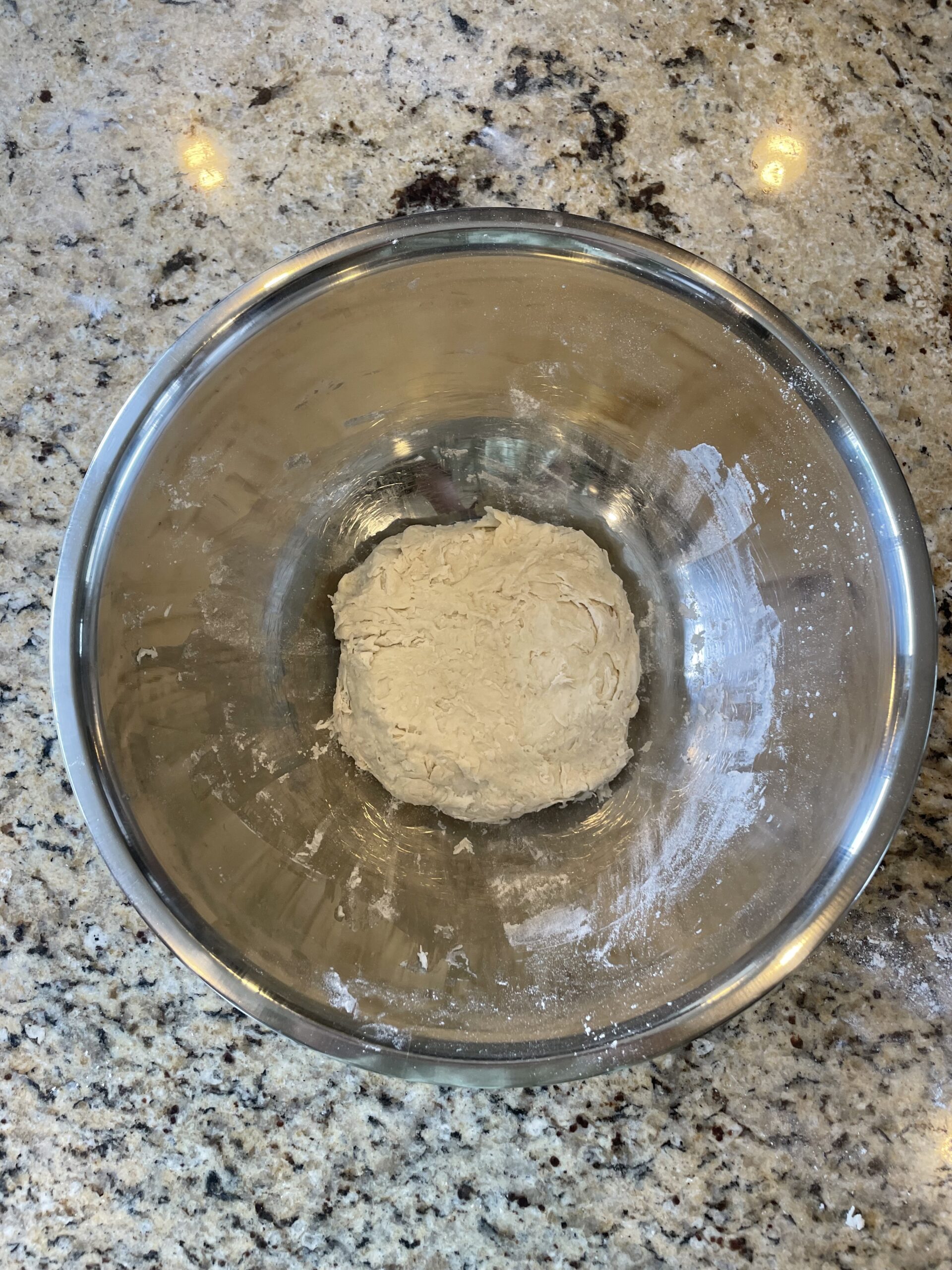 completed ball of dough after mixing together wet and dry ingredients