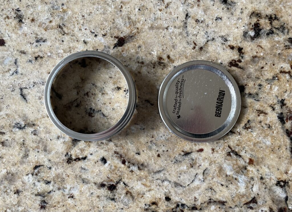 This photo shows the tool I am using to cut the english muffins. The tool is the lid of a mason jar