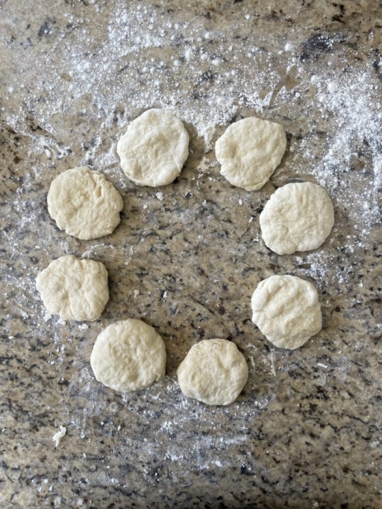 Shows all 8 tortilla balls flattened