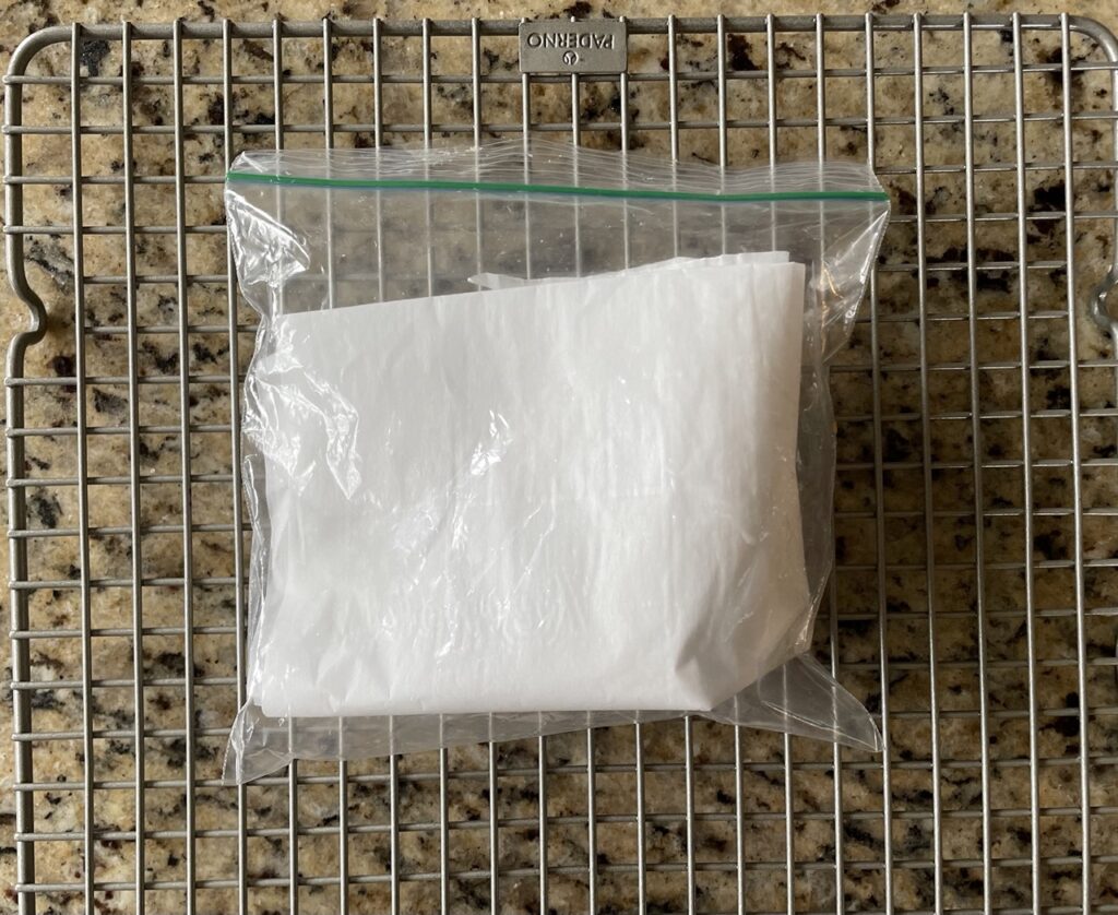bag of used parchment paper
