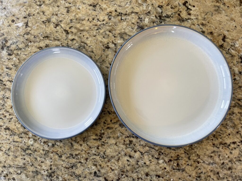 shows one small plate and one big plate for size comparison of tortillas